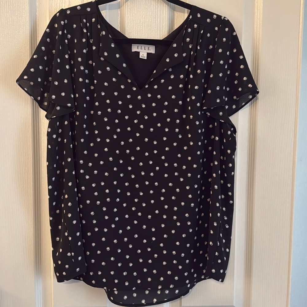 Elle polka dot flutter sleeve blouse.
